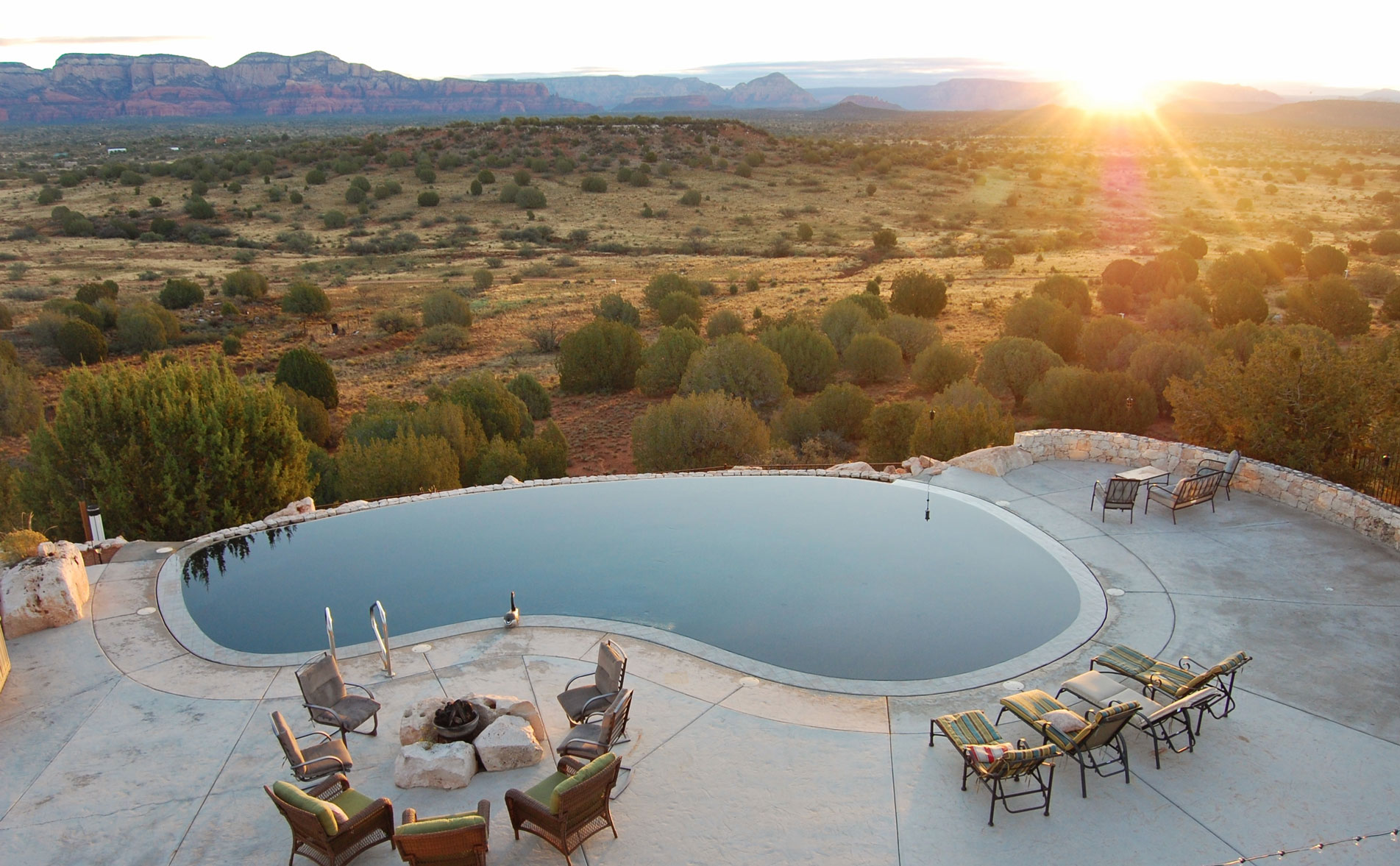 image of reflective pool in a desert landscape